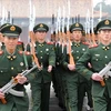 Binh sĩ bán quân sự Trung Quốc tập luyện ngoài doanh trại ở Bắc Kinh. (Nguồn: AFP/TTXVN)