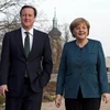 Thủ tướng Đức Angela Merkel và Thủ tướng Anh David Cameron trong khuôn viên nhà khách chính phủ ở ngoại ô Berlin. (Nguồn: AFP/TTXVN)