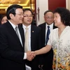 Chủ tịch nước Trương Tấn Sang gặp gỡ bạn bè Trung Quốc. (Ảnh: Nguyễn Khang/TTXVN)