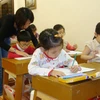 Học sinh luyện chữ tại lớp của cô Liên Hương. (Ảnh: Internet).