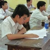 Thí sinh làm bài thi trong kỳ thi đại học năm 2010. (Ảnh: Phạm Mai/Vietnam+)