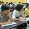 Thí sinh nghe phổ biến quy chế thi đại học năm 2011. (Ảnh: Phạm Mai/Vietnam+)