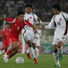 Lamnao (8, áo đỏ), nhạc trưởng của đội tuyển U23 Lào. (Ảnh: Quang Liêm).
