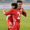Nụ cười chiến thắng của cầu thủ ghi bàn thắng Al Il Bom. (Ảnh: Minh Hoàng).