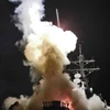 Tên lửa Tomahawk được phóng đi từ tàu khu trục USS Barry hướng vào Libya (Nguồn: US Navy)