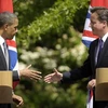 Tổng thống Mỹ Obama bắt tay Thủ tướng Anh David Cameron ngày 25/5 tại London, khi bàn thảo về tình hình Libya (Nguồn: Getty)