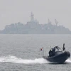 Thủy thủ Hàn Quốc tiếp cận đảo Yeonpyeong. Hinh tư liệu (Nguồn: AFP)