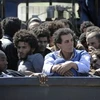 Lực lượng trung thành với ông Gaddafi bị bắt làm tù binh (Nguồn: Reuters)