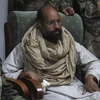 Saif al-Islam khi mới bị các tay súng ở Zintan bắt giữ (Nguồn: Reuters)