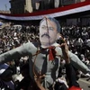 Người biểu tình treo hình nộm ông Saleh (Nguồn: Press TV)