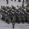 Cảnh sát Trung Quốc được điều động tại Tân Cương (Nguồn: Reuters)