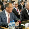 Ngoại trưởng Nga Sergei Lavrov (trái) tham dự hội nghị quốc tế về tình hình Syria hôm 30/6 tại Thụy Sĩ (Nguồn: THX-TTXVN)