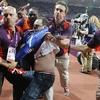 Gill-Webb bị bắt giữ sau khi ném chai bia xuống đường chạy về phía Usain Bolt (Nguồn: AFP)