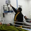 Bệnh nhân nhập viện do ngộ độc thuốc ho ở Pakistan (Nguồn: AFP)