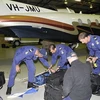 Đội cứu nạn chuẩn bị trước khi bay tới vùng biển Coral tìm kiếm xác người cha (Nguồn: news.au)