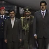 Tổng thống Iran Mahmoud Ahmadinejad và Bộ trưởng Ngoại giao Venezuela Nicolas Maduro. (Ảnh: Reuters)