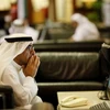Nhà đầu tư lo lắng khi nhìn thấy sự sụt giảm ở các thị trường tài chính Dubai. (Ảnh: Reuters)