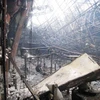 Vụ cháy khiến cho toàn bộ nội thất bên trong bị hư hỏng nặng nề, chỉ còn trơ khung sắt (Ảnh: Sơn Bách/Vietnam+)
