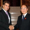 Phó Thủ tướng tiếp đoàn Diễn đàn kinh tế và tài chính Việt-Pháp. (Ảnh: Doãn Tấn/TTXVN)