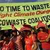 Tuần hành ủng hộ những hành động chống lại sự biến đổi khí hậu ở Philippines. (Ảnh: AFP/TTXVN)