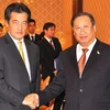 Ngoại trưởng Nhật Bản Okada và Phó Thủ tướng Phạm Gia Khiêm. (Ảnh: Thanh Tùng/TTXVN)