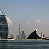 Ba công trình kiến trúc nổi tiếng do tập đoàn Dubai World xây dựng ở ngoài khơi bờ biển Dubai, Các tiểu vương quốc Arập thống nhất ngày 21/12. (Ảnh: AFP/TTXVN)