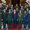 Thủ tướng Nguyễn Tấn Dũng chụp ảnh lưu niệm với các đại biểu. (Ảnh: Đức Tám/TTXVN) 