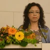 Bà Nhữ Thị Hồng Liên, Phó Chủ tịch Ủy ban Nhân dân tỉnh Quảng Ninh, tại buổi hội thảo. (Ảnh: Phân xã TTXVN tại Tokyo)