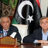 Thủ tướng Ali Zeidan (trái) tại cuộc họp báo ở Tripoli sau khi ông được trả tự do. (Nguồn: AFP/TTXVN)