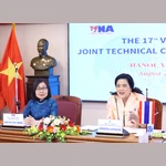 Phó Tổng Giám đốc Thông tấn xã Việt Nam Đoàn Thị Tuyết Nhung và Tổng Giám đốc PRD Sudruetai Lertkasem đồng chủ trì cuộc họp. (Ảnh: Phương Hoa/TTXVN)