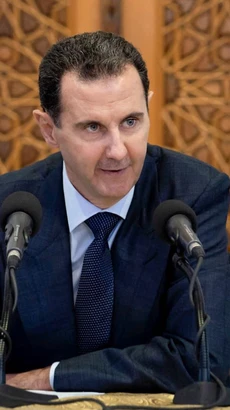 Tổng thống Syria Bashar al-Assad phát biểu trong một cuộc họp tại Damascus. (Ảnh: AFP/TTXVN)