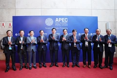 Hội đồng Tư vấn Kinh doanh APEC (ABAC) Việt Nam đón Chủ tịch nước Lương Cường và các đại biểu dự Hội nghị Thượng đỉnh Doanh nghiệp APEC – CEO Summit. (Ảnh: Lâm Khánh/TTXVN)