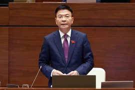 Bộ trưởng Bộ Tư pháp Lê Thành Long phát biểu giải trình, làm rõ một số vấn đề đại biểu Quốc hội nêu. (Ảnh: Doãn Tấn/TTXVN)