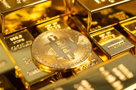 Giao dịch bitcoin được dự đoán sẽ phổ biến hơn cả vàng. (Nguồn: iStock)
