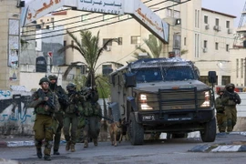 Binh sỹ Israel được triển khai tại trại tị nạn Al-Amari ở gần Ramallah, Bờ Tây, ngày 4/3/2024. (Ảnh: AFP/TTXVN)