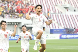 Minh Khoa sút phạt 11m thành công nâng tỷ số lên 2-0 cho U23 Việt Nam trong trận gặp U23 Malaysia. (Ảnh VFF/TTXVN phát)