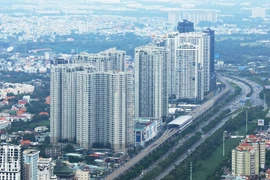 Các tòa chung cư cao tầng chạy dọc đại lộ Võ Nguyên Giáp, thành phố Thủ Đức, Thành phố Hồ Chí Minh. (Ảnh: Hồng Đạt/TTXVN)