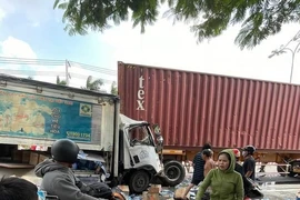 Hiện trường vụ tai nạn giao thông liên hoàn tại huyện Bàu Bàng, tỉnh Bình Dương. (Ảnh: TTXVN phát)
