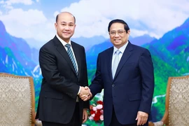 Thủ tướng Phạm Minh Chính tiếp Tổng Thư ký Ban Dân vận Trung ương Đảng Nhân dân Campuchia Hun Many. (Ảnh: Dương Giang/TTXVN)