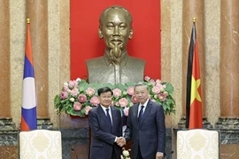 Chủ tịch nước Tô Lâm tiếp Tổng Bí thư, Chủ tịch nước Lào Thongloun Sisoulith. (Ảnh: Nhan Sáng/TTXVN)