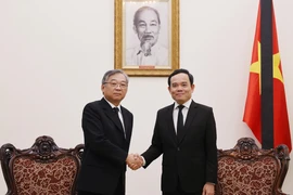 Phó Thủ tướng Trần Lưu Quang tiếp Phó Thủ tướng Singapore Gan Kim Yong. (Ảnh: Lâm Khánh/TTXVN)