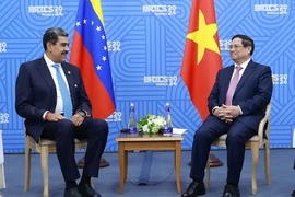 Thủ tướng Phạm Minh Chính gặp Tổng thống Venezuela Nicolas Maduro. (Ảnh: Dương Giang/TTXVN)