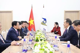 Thủ tướng Phạm Minh Chính gặp Chủ tịch Hội đồng Ủy ban Kinh tế Á-Âu (EEK) Bakytzhan Sagintayev. (Ảnh: Dương Giang/TTXVN)