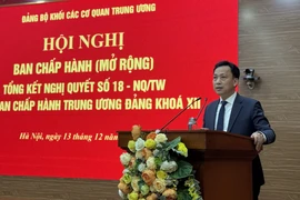 Phó Bí thư Thường trực Đảng ủy Khối Lại Xuân Lâm phát biểu tại Hội nghị. (Ảnh: Diệp Trương/TTXVN)