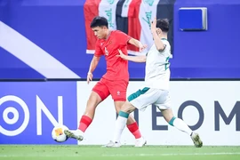 Tuyển U23 Việt Nam (áo đỏ) chia tay Vòng chung kết U23 châu Á 2024 sau thất bại 0-1 trước U23 Iraq. (Ảnh: AFC)