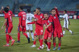 Chiến thắng 3-0 trước Timor Leste giúp Đội tuyển Singapore (áo đỏ) "rộng cửa" đi tiếp tại bảng A - AFF Cup 2024. (Ảnh: Việt Anh/Vietnam+)