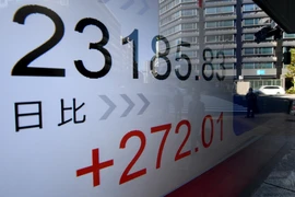 Bảng tỉ giá chứng khoán tại thủ đô Tokyo, Nhật Bản. (Ảnh minh họa. AFP/TTXVN)