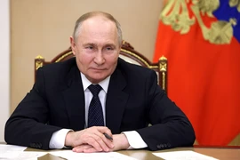 Tổng thống Nga Vladimir Putin tại cuộc họp trực tuyến ở Moskva. (Ảnh: AFP/TTXVN)