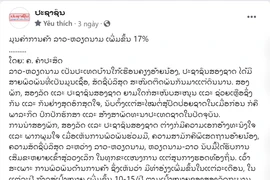 Bài viết trên báo Pasaxon đề cập quan hệ thương mại Việt Nam-Lào giúp đạt mục tiêu tăng trưởng mà Chính phủ hai nước đề ra. (Ảnh: Xuân Tú/TTXVN