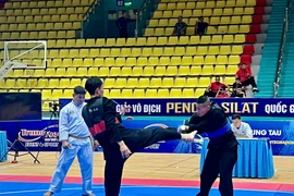 Sau lễ khai mạc Giải vô địch Pencak Silat Quốc gia năm 2024, các vận động viên bước vào các nội dung thi đấu của giải. (Ảnh: Huỳnh Sơn/TTXVN)